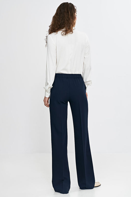 Stylish Nife viscose shirt for women showcasing a classic cut with a button closure and detailed dimensions for EU sizes 36-42.