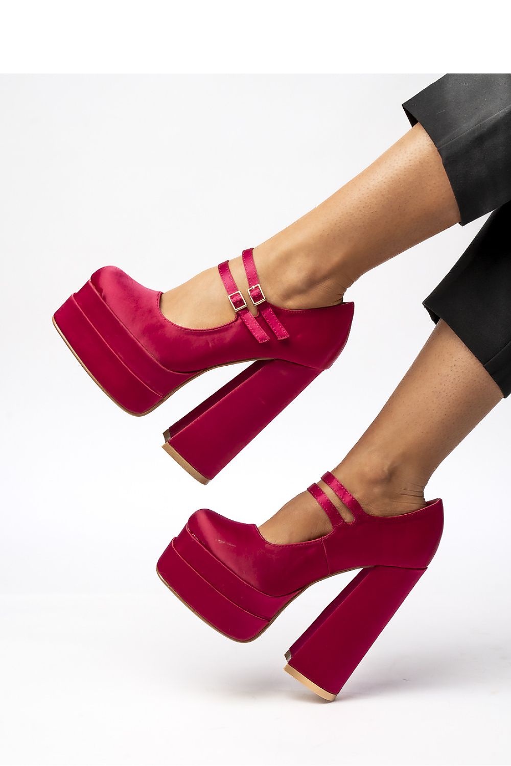 Stylish fuchsia satin platform Mary Jane pumps by Inello, designed to provide comfort and elegance for glamorous outings.