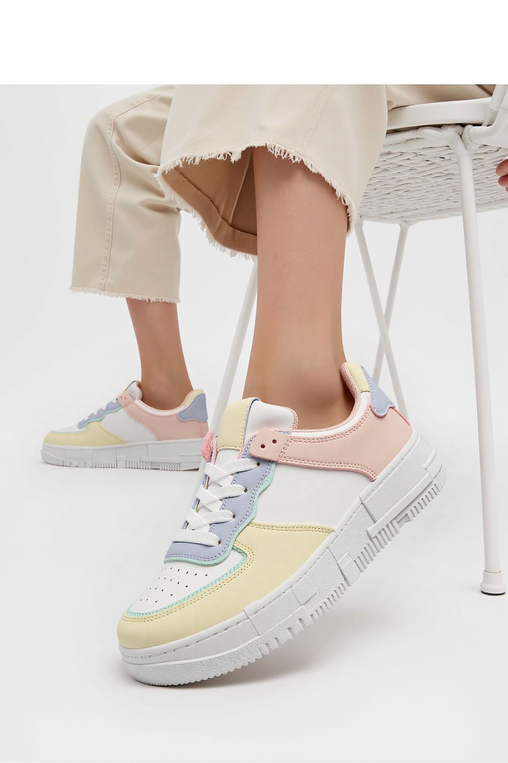 Elegant depiction of the Oasis Multe Women's Pastel Sneakers by Inello, showcasing the comfortable flat sole and modern design ideal for fashionable everyday wear.