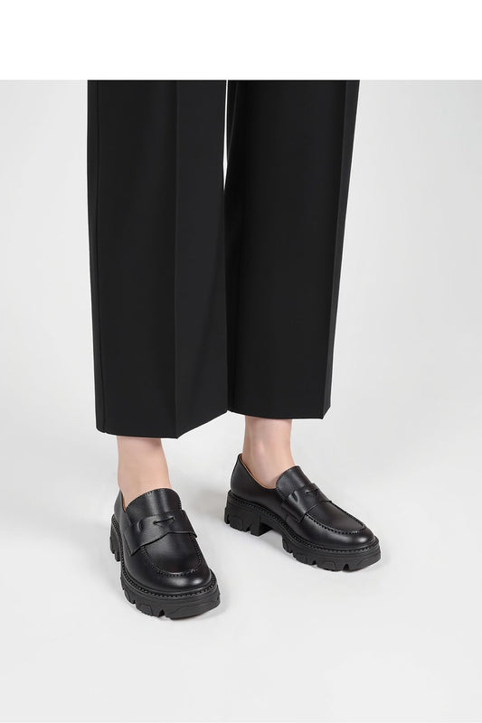 Close-up view of Inello Monza Nero sophisticated loafers highlighting the premium synthetic leather material and intricate stitching.