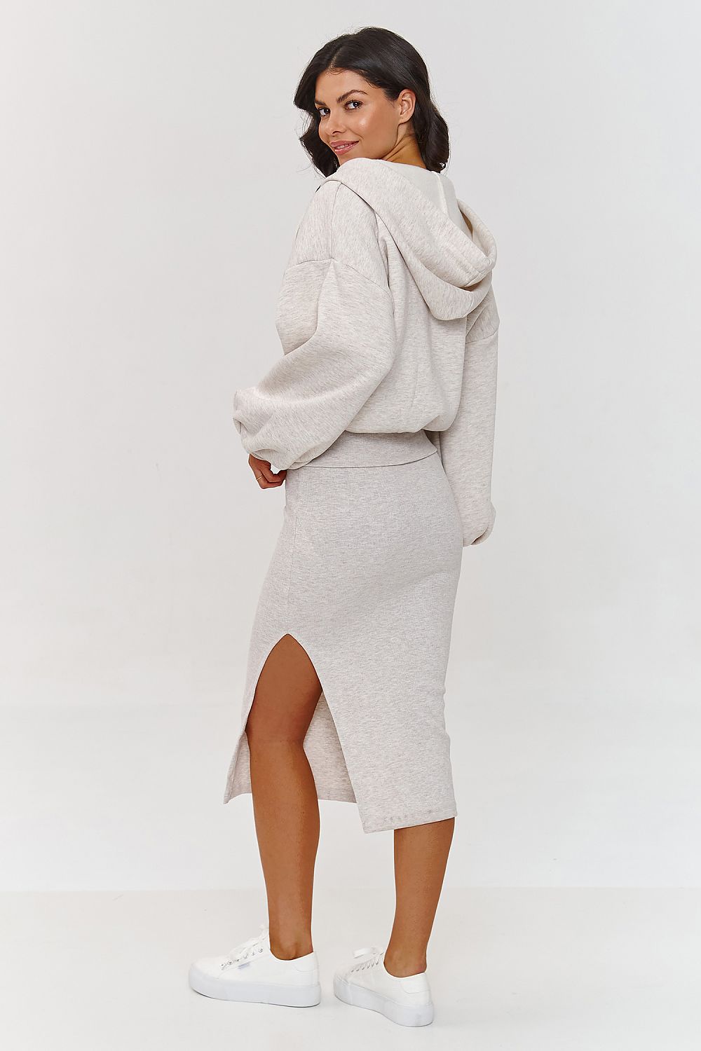 Versatile women's outfit comprising a stylish striped dress and a sophisticated hoodie set from Makadamia, suitable for all seasons.