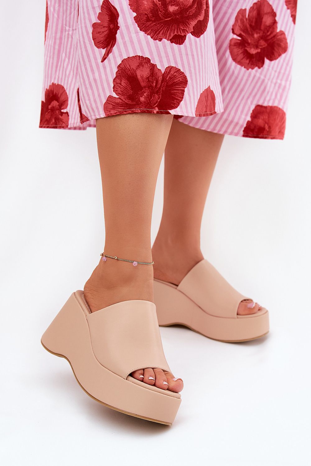 Sophisticated eco leather flip-flops by Step in Style, designed with a flattering 9cm wedge heel, ideal for summer styling.