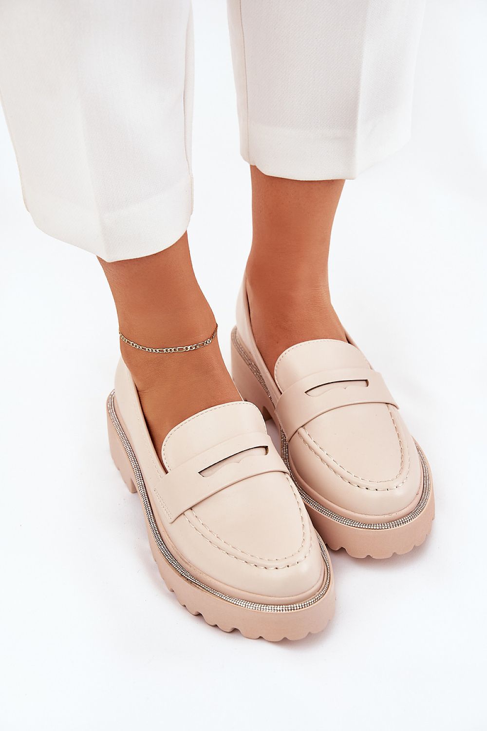 Stylish eco-friendly suede loafers for women, adorned with rhinestone accents by Step in Style, highlighting their luxurious feel and classic rounded toe for all-day comfort.
