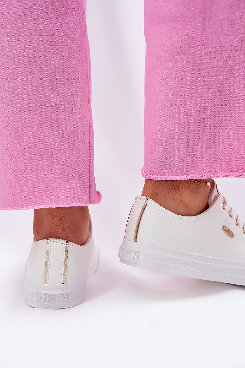 Luxury Big Star women's eco leather sneakers featuring elegant golden accents. Available in sizes EU 36-41, these stylish and comfortable shoes blend quality craftsmanship with modern design for everyday chic.