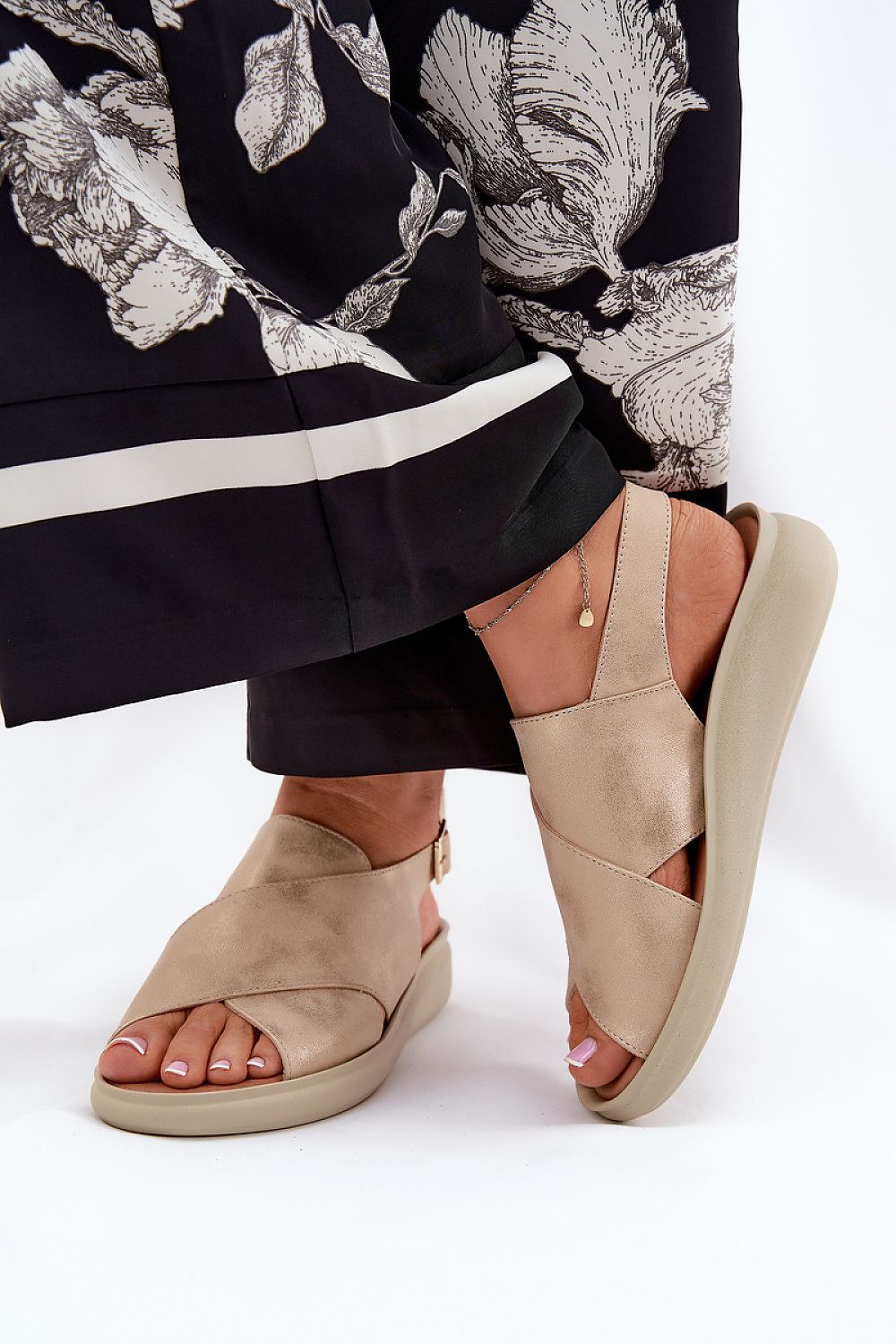 Jezzi Women's eco leather sandals styled with a beautiful summer ensemble, combining elegance with comfort.