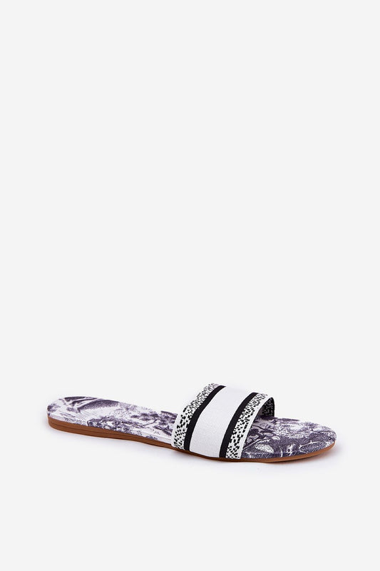 Close-up of Step in Style luxury flip-flops showcasing their vibrant unique pattern, ideal for stylish summer outfits.