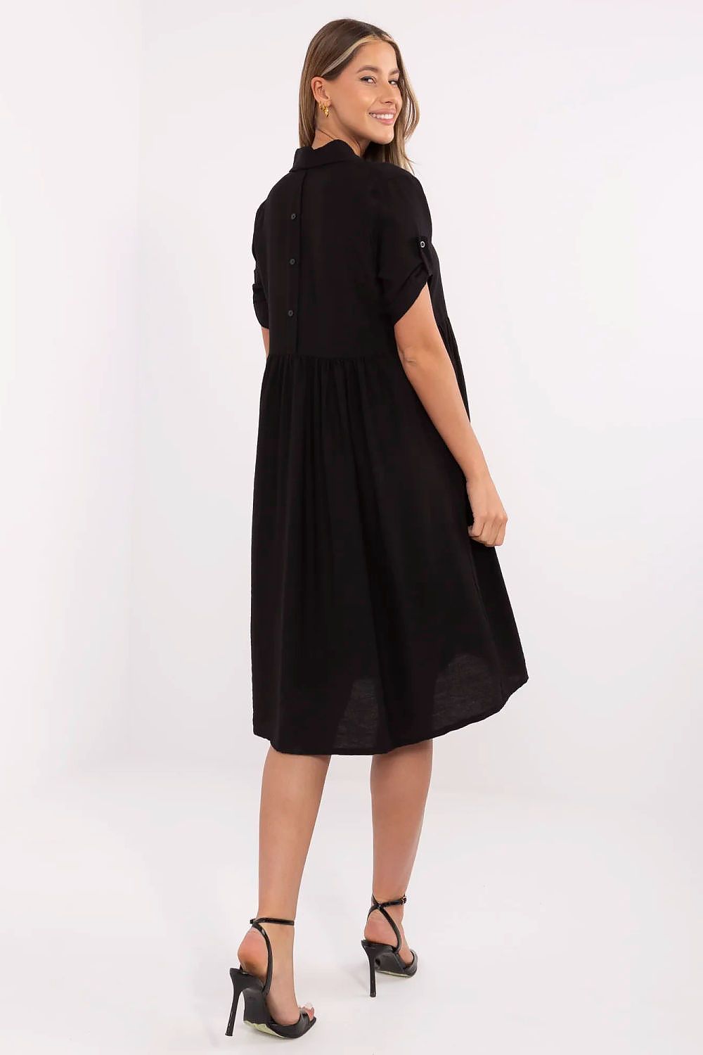 Detail of the Italy Moda Elegant Midi Shirt Dress showcasing its breathable fabric, button closure, and feminine pleats, ideal for European sizes.