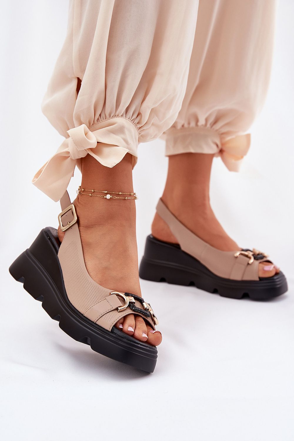 Step in style presents elegant women's sandals featuring an adjustable buckle and 7.5cm wedge heel, perfect for enhancing summer outfits.