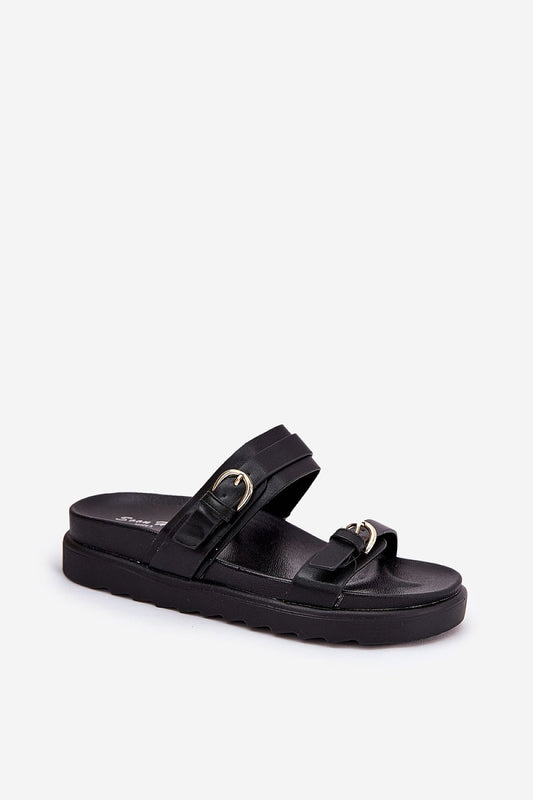 Close-up of Step in style women's platform flip-flops with artificial leather straps and elegant buckle accents for a sophisticated touch.