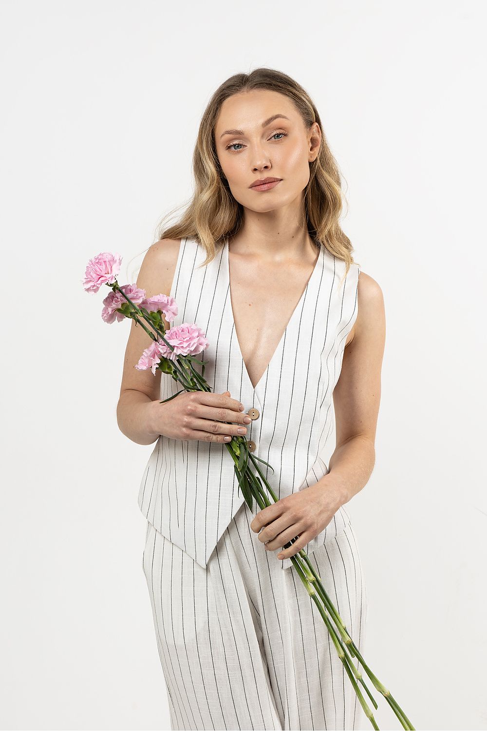 Chic and elegant linen vest for women from awama, crafted for style and comfort, perfect for both casual and formal occasions.
