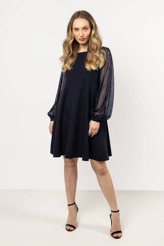 Close-up detail of Awama's luxury evening dress showcasing the glossy finish of the sheer tulle sleeves.