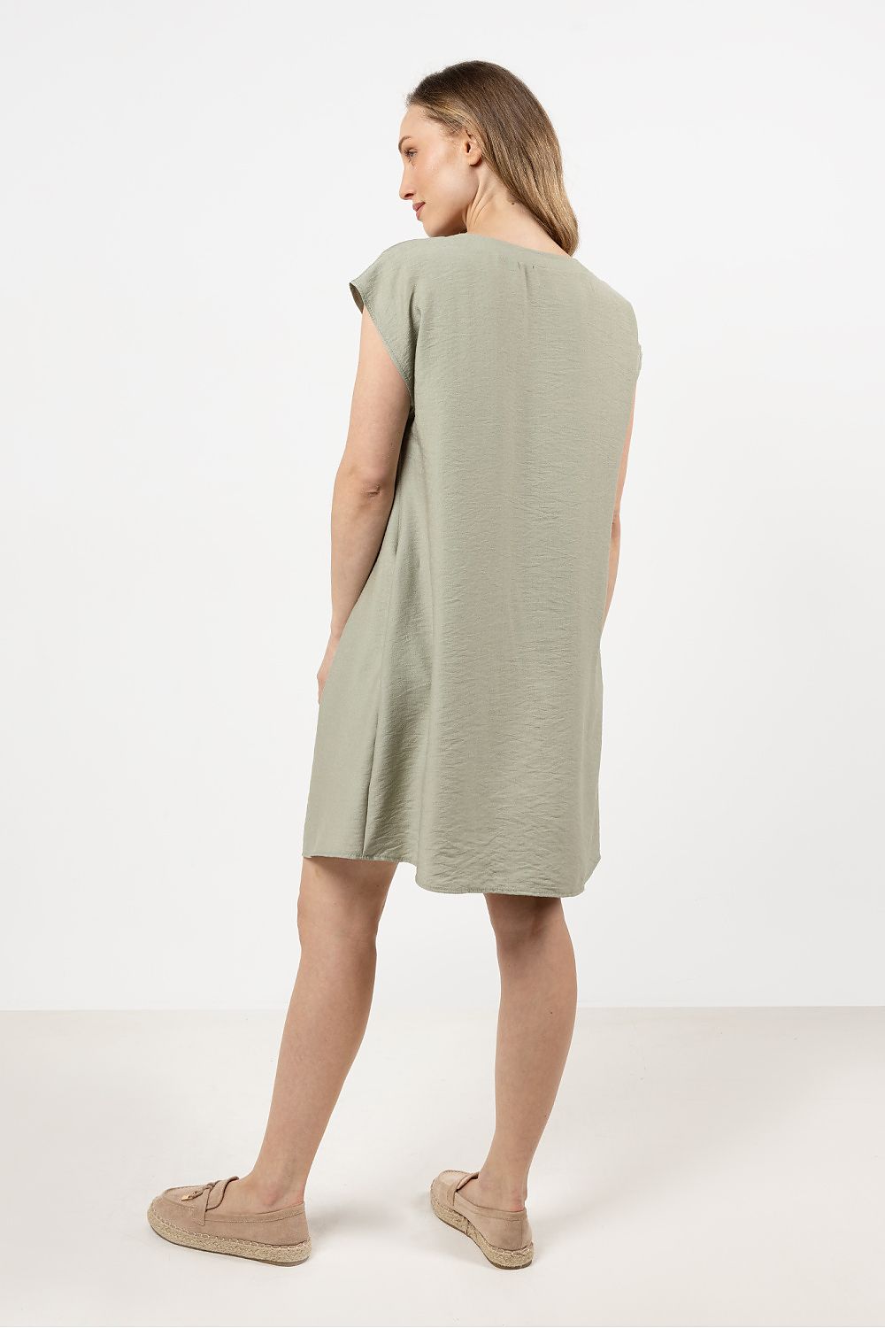 Detail view of the Awama Daydress, highlighting the lightweight rayon fabric and feminine neckline gathering, perfect for chic casual wear.