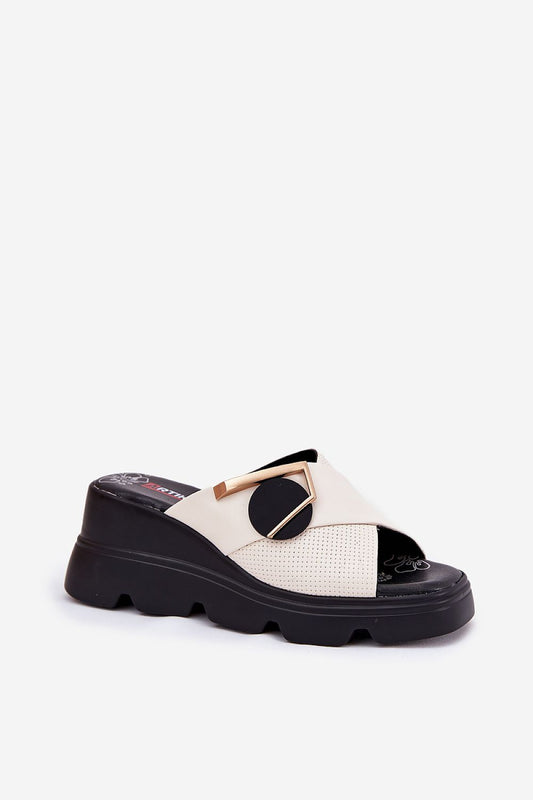 Chic summer leather sandals featuring a stylish geometric design and 7 cm wedge heel, brought to you by Step in Style.