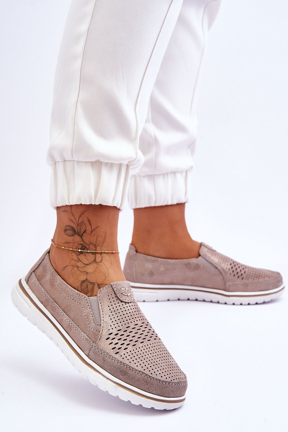 Stylish women's platform loafers in luxurious suede leather by Step in Style, featuring a delicate lacy pattern, ideal for sophisticated everyday wear.