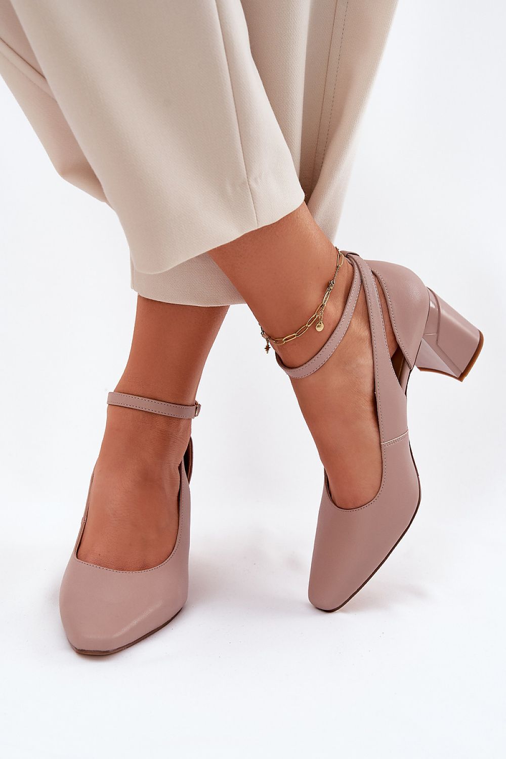 Stylish Maciejka Women's Block Heel Pumps showcasing premium natural leather and a comfortable 7 cm heel, perfect for day-long wear, presented by Step in Style.