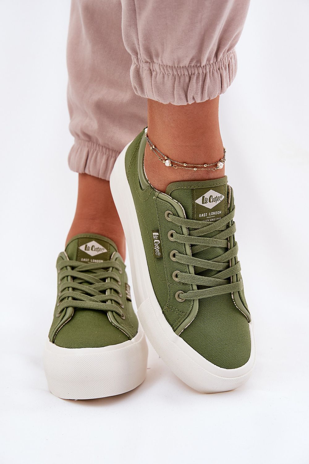 Stylish Lee Cooper women's textile sneakers showcasing a chic platform design, perfect for comfort and support by Step in Style.
