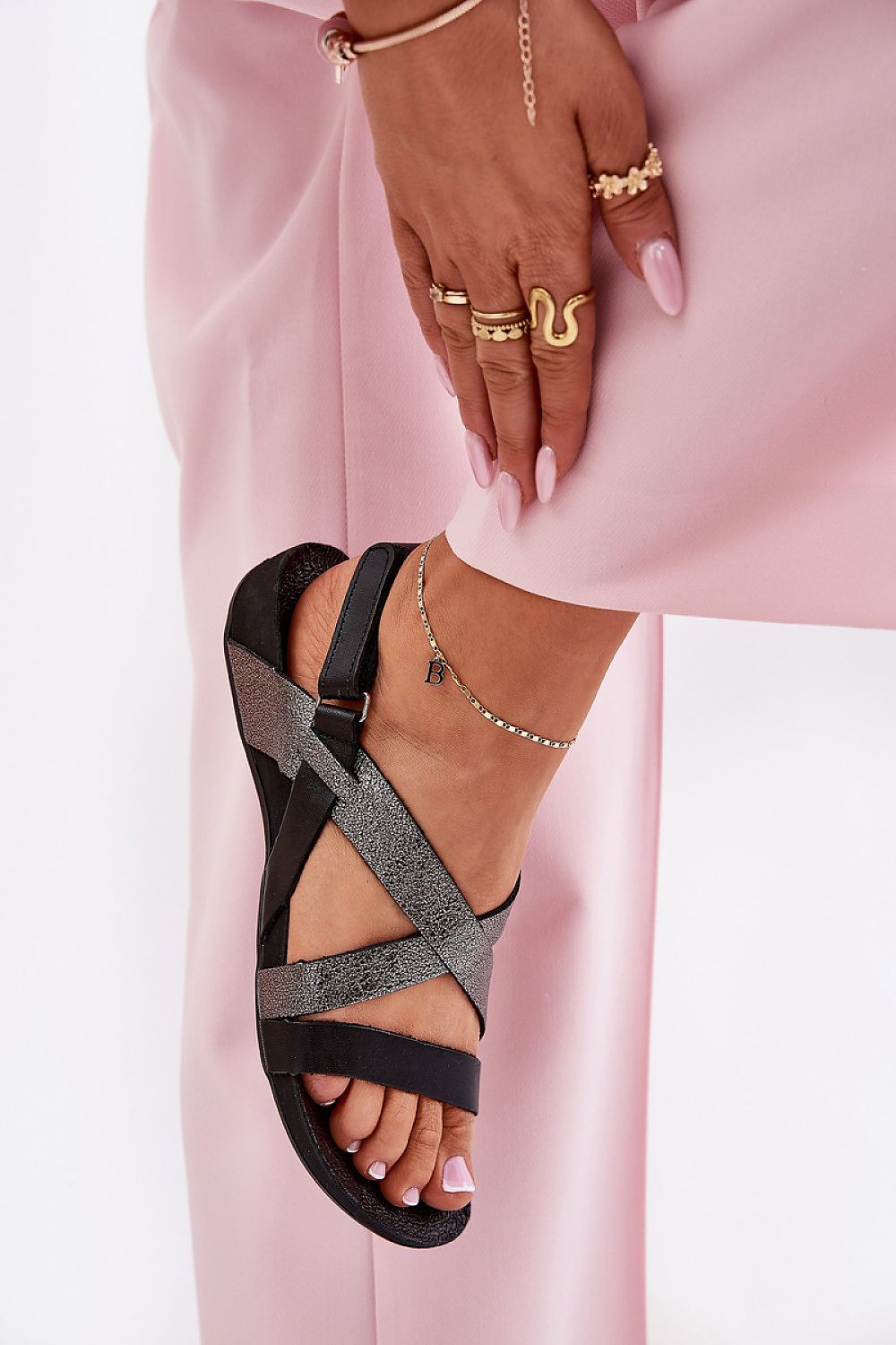 Chic summer outfit pairing Step in Style elegant leather sandals, ideal for dresses and trousers, highlighting comfort and luxury.