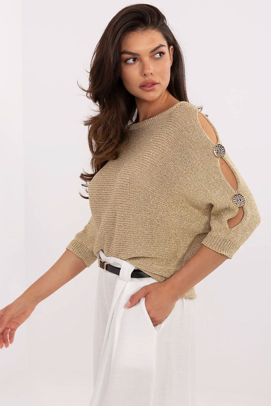 Close-up of Italy Moda's women's sweater showcasing delicate openwork pattern and soft viscose material enhanced with metallic thread for an elegant look.