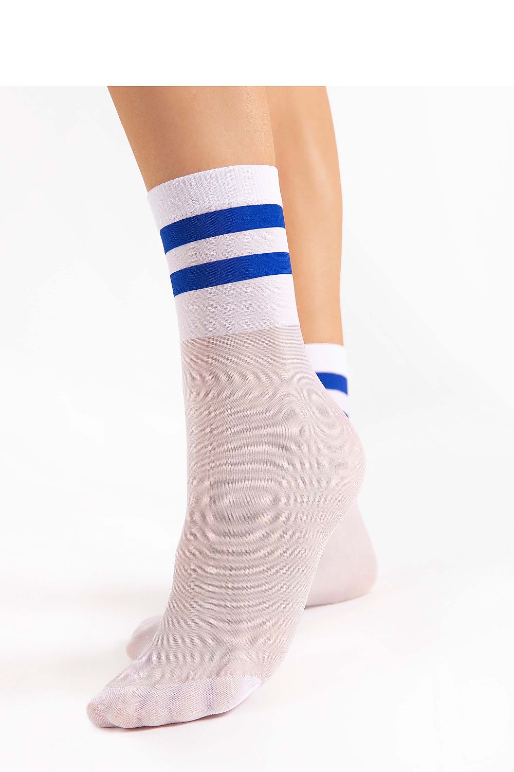 Fiore Elegant 20 DEN High Socks for Women in luxurious transparent fabric featuring a non-binding cuff, perfect for stylish and comfortable all-day wear.
