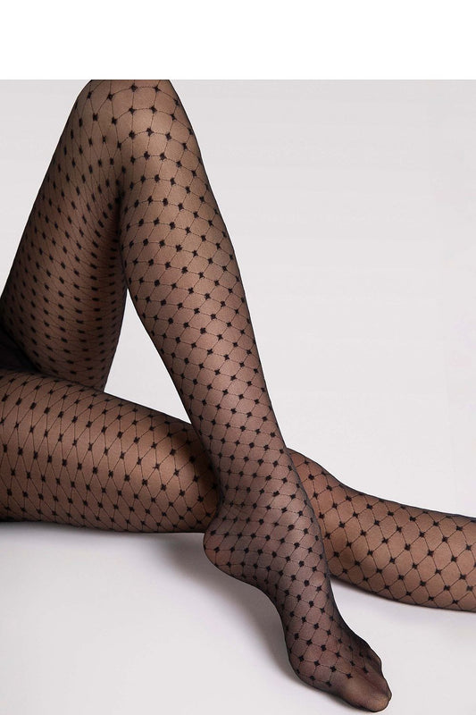 Close-up view of Fiore 20 DEN tights showcasing intricate patterns, perfect for elevating both casual and sophisticated outfits.