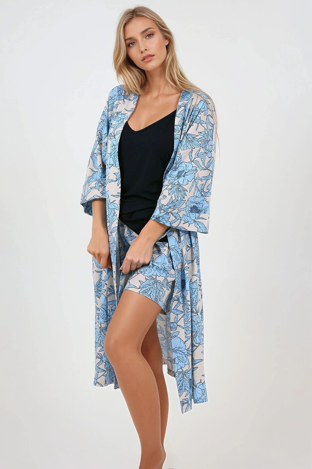Luxurious Momenti Per Me elegant women's pajamas set featuring a stylish V-neck camisole and comfortable shorts, crafted from hypoallergenic and breathable materials for ultimate comfort.