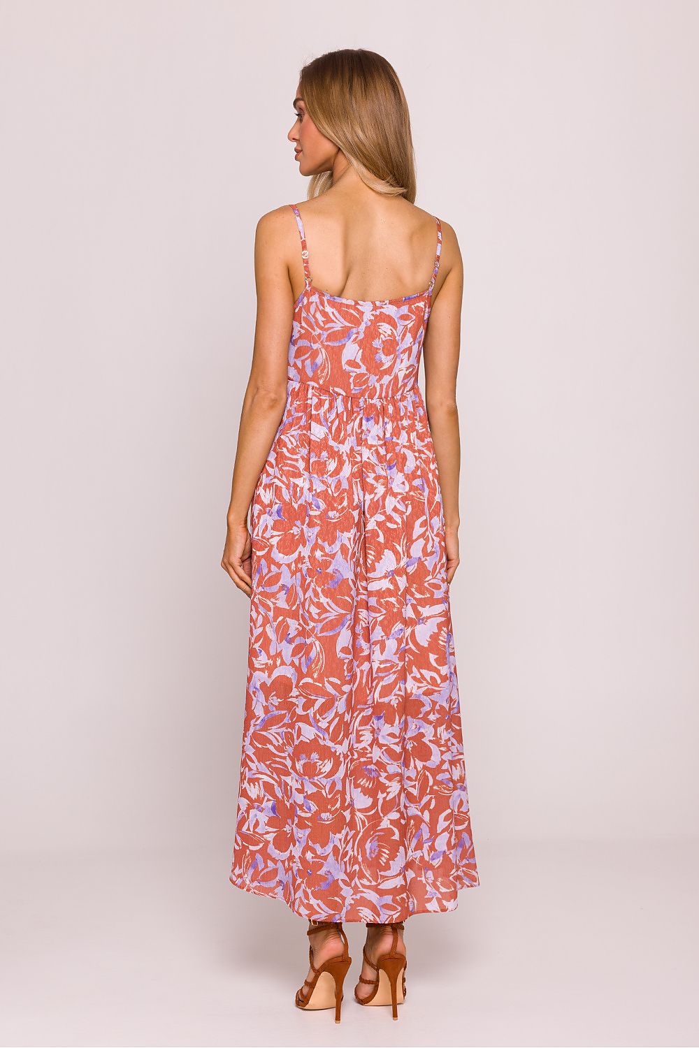 Model wearing the Moe Daydress, emphasizing its flattering cut and versatile style suitable for holidays and parties.