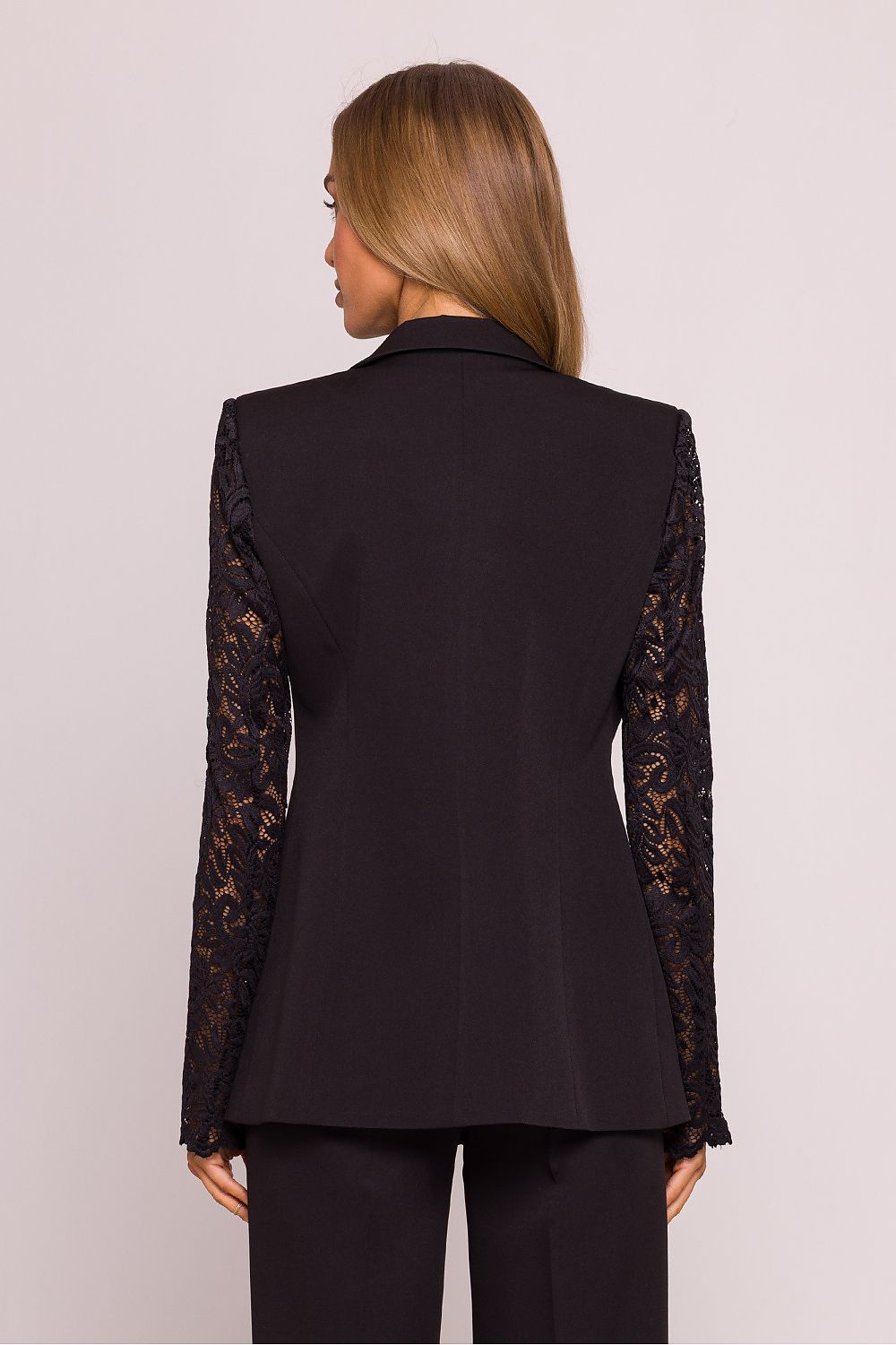 Back view of the Elegant Lace Sleeve Blazer Jacket by Moe, demonstrating its polished look and quality craftsmanship, suitable for diverse styling options.