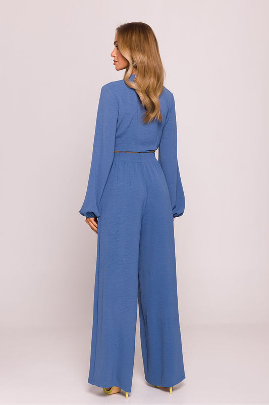 Close-up of Moe Women's Lightweight Crepe Trousers, highlighting the refined crepe fabric and stylish silhouette perfect for sophisticated styling.