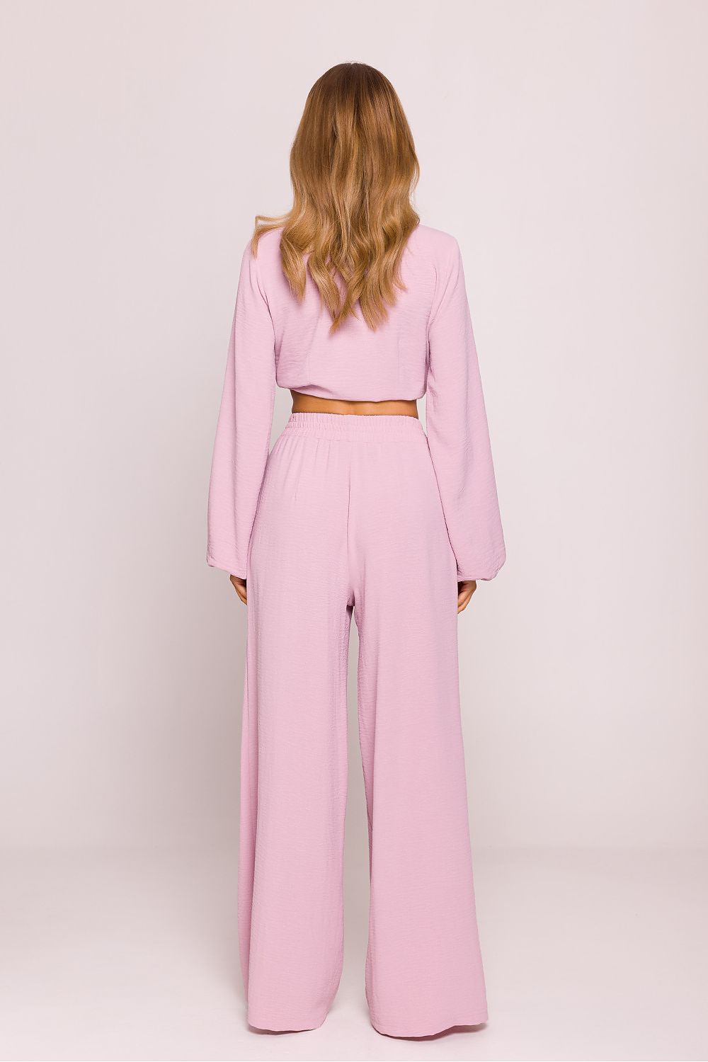 Close-up detail of Moe Women's Lightweight Crepe Trousers, highlighting the soft texture and premium fabric, ideal for luxury casual or formal wear.