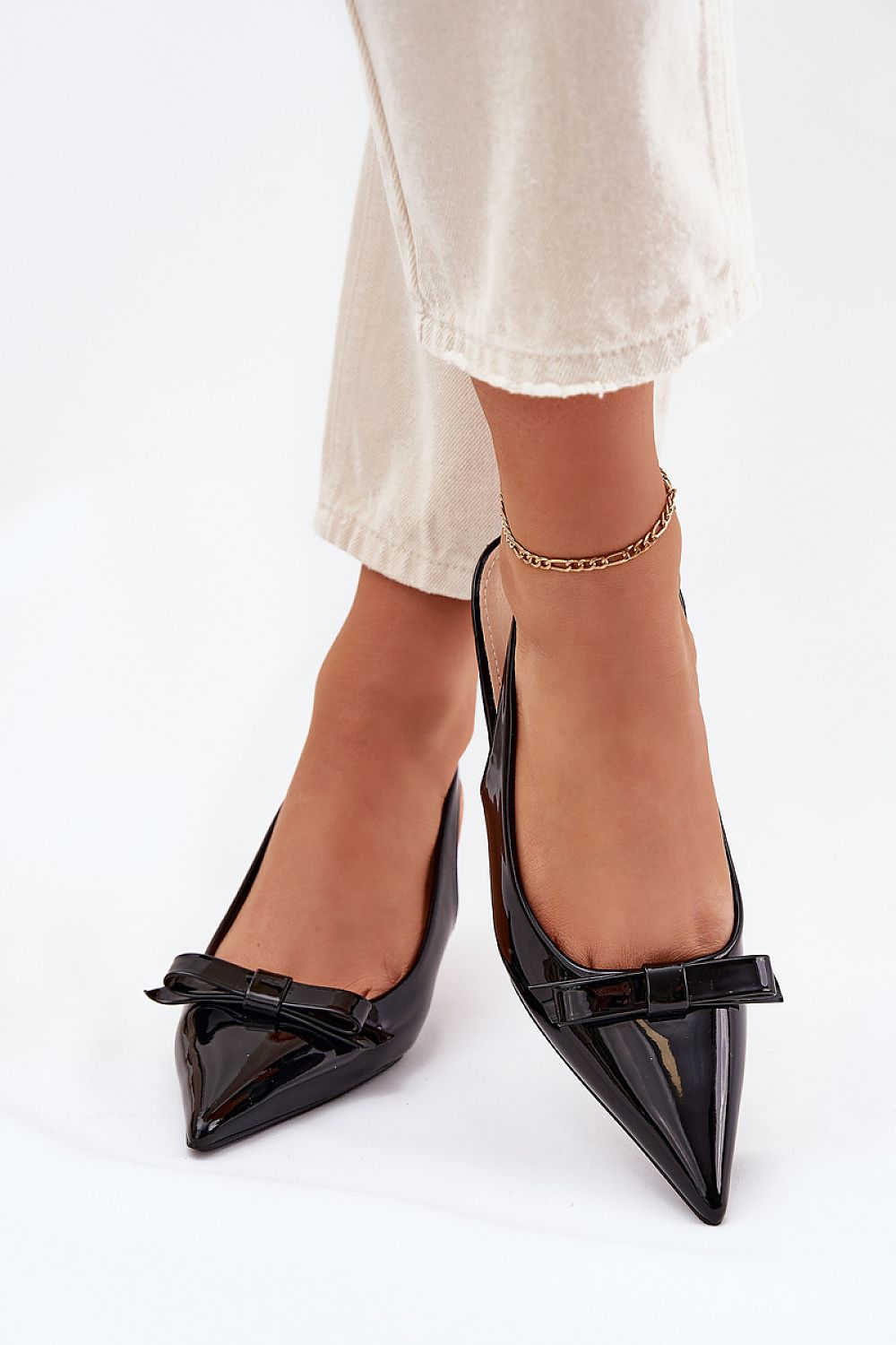 Elegant women's eco leather heel sandals by Step in Style, featuring a 6 cm height, pointed toes, and a stylish bow, perfect for wedding and evening events.
