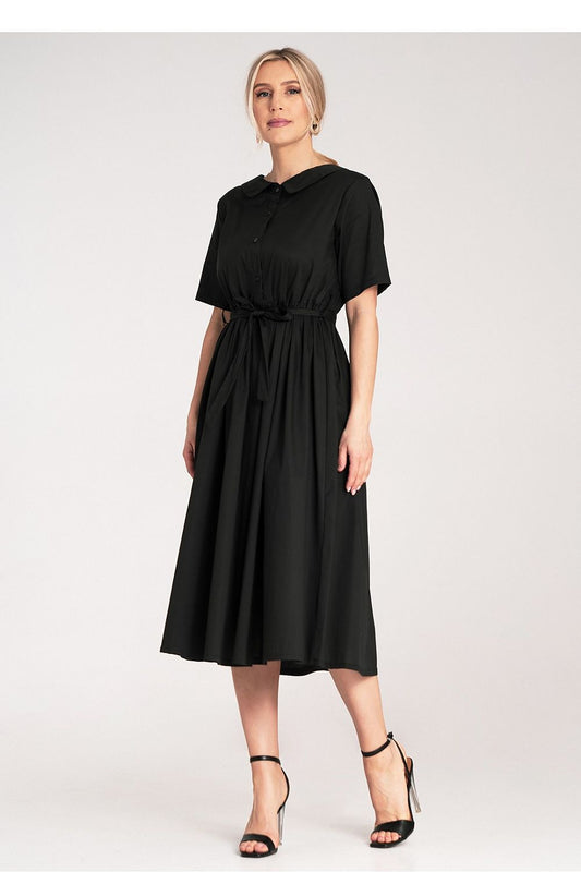 Close-up view of Figl's exquisite shirt fabric used in an elegant midi-length daydress, ideal for a luxurious daytime look.