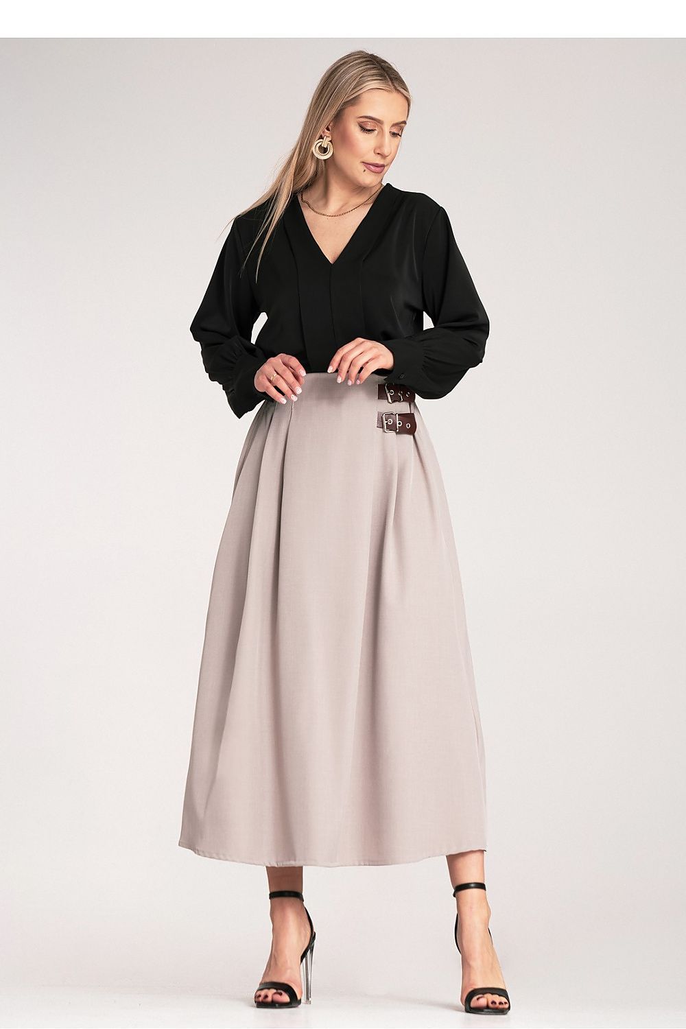 Close-up of Figl Midi Skirt fabric texture displaying high-quality polyester and spandex blend, crafted for comfort and style.