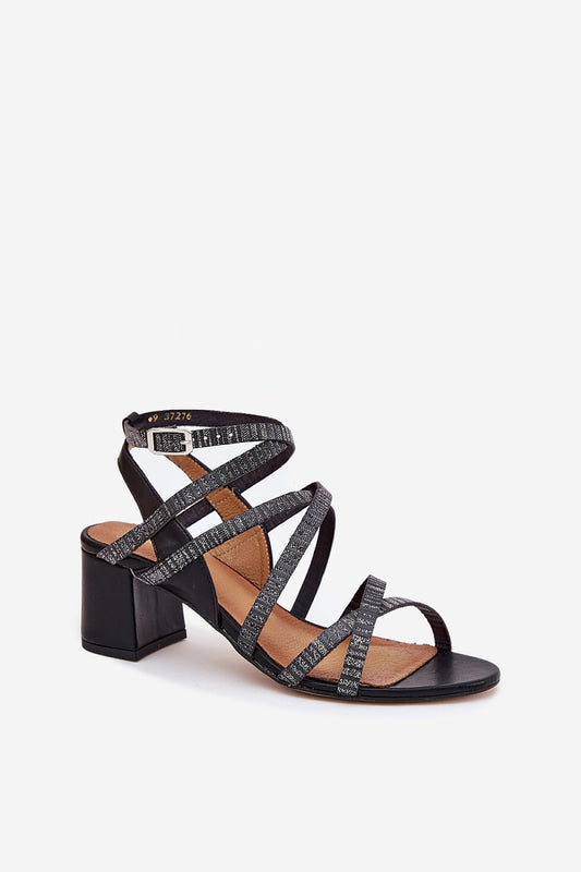 Close-up view of Step in Style's elegant women's sandals featuring natural leather and stylish interwoven straps, showcasing their luxurious design and comfort.