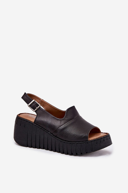 Close-up of Step in Style women's sandals made with natural leather, showcasing the adjustable buckle strap and soft insole for all-day comfort.
