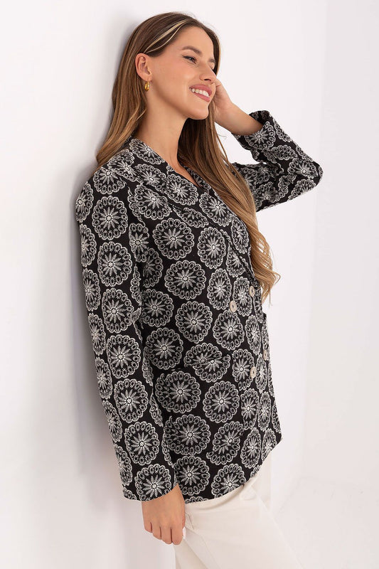 Close-up view of the luxurious openwork embroidery on Lakerta's elegant women's blazer, highlighting its unique feminine appeal.