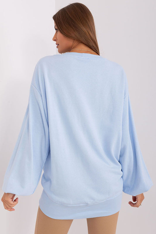 Close-up detail of Ex Moda Cotton-Blend Sweatshirt's soft fabric, highlighting luxury and trendy design.