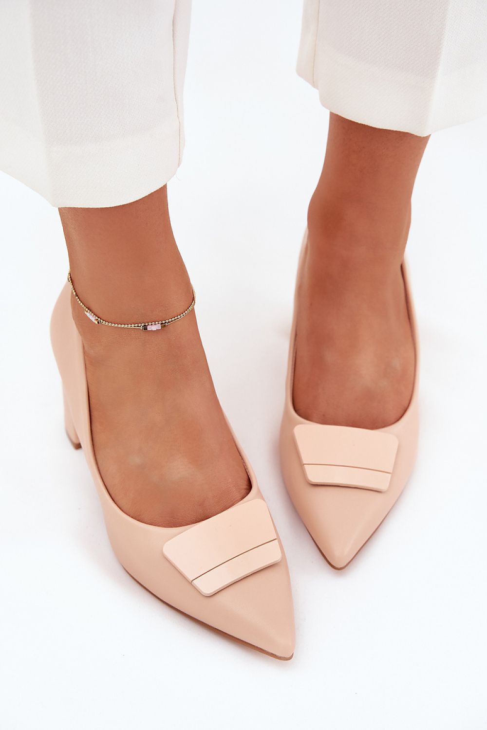 Elegant women's block heel pumps in eco leather by Step in Style, featuring a chic pointed toe and stylish decorative detail, perfect for formal occasions.