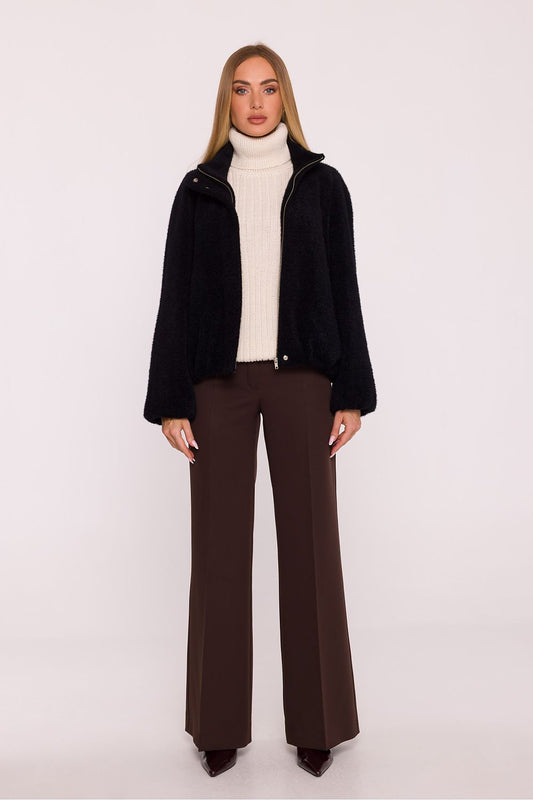 Stylish women's oversized jacket in soft knitwear by Moe, featuring a stand-up collar and zip fastening, perfect for casual elegance.