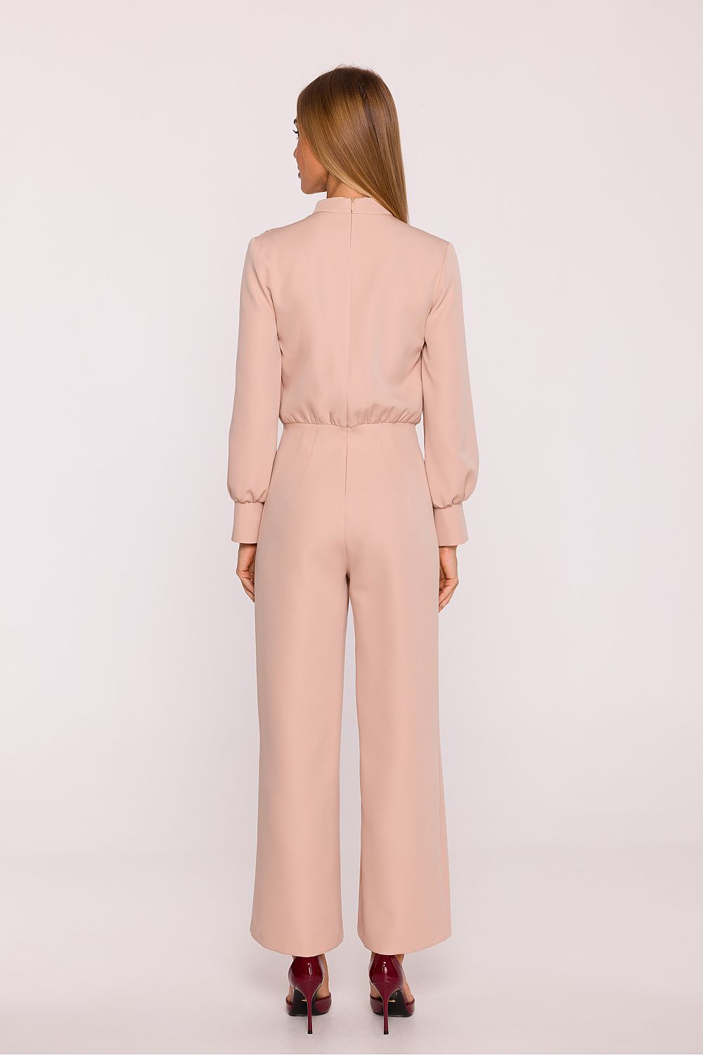 Elegant smooth fabric jumpsuit with a stand-up collar by Moe, showcasing a fitted waist and wide 7/8 length trousers, perfect for chic and luxurious styling.