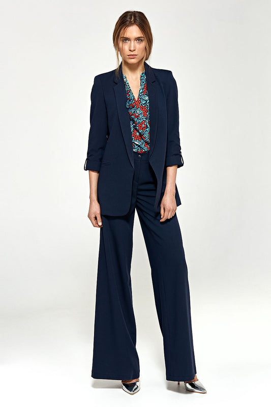 Stylish Nife navy blue palazzo pants designed with flared legs, ideal for a chic and sophisticated look.