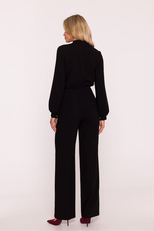 Stylish long-sleeve jumpsuit by Stylove, showcasing a stand-up collar and subtle ruffle accents.
