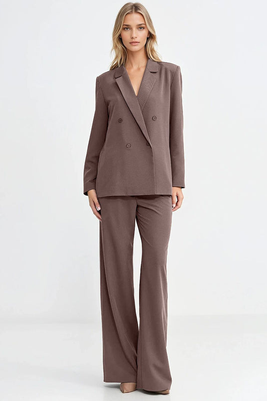 Elegant women's oversized blazer by Nife featuring a classic lapel collar and double-breasted design, perfect for both casual and formal outfits.