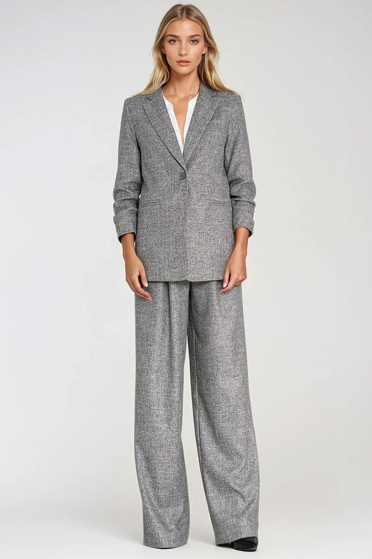 Stylish Nife women's jacket showcasing delicate pleats and shoulder pads, tailored for a luxurious fit in sizes EU 36 to EU 42.