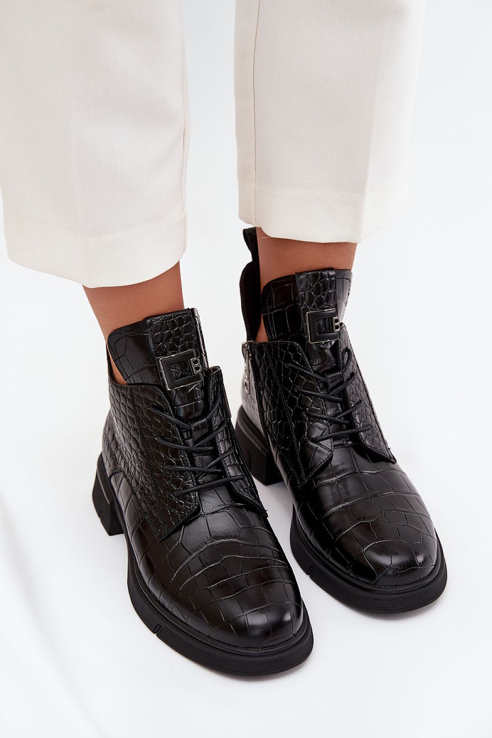 Close-up of Vinceza Women's Natural Leather Ankle Boots showcasing the quality craftsmanship and stylish zipper, suitable for everyday wear.