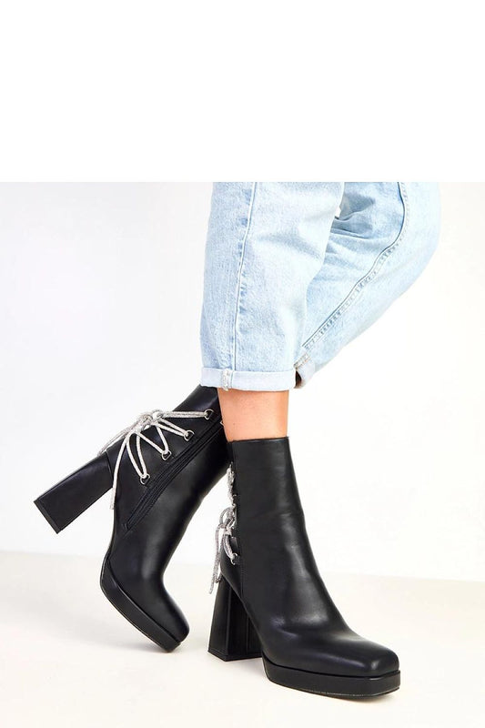 Stylish women's eco-leather ankle boots from Solea featuring a dazzling zircon lace-up design, combining luxury and comfort with a round toe and a chic 10 cm pillar heel.