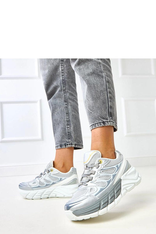 Solea sport shoes with laced closure and a modern round toe design, showcasing comfort and sophistication for the modern woman.