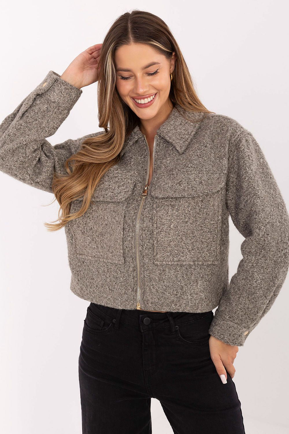 Elegant women's artificial fur jacket with long sleeves by Sublevel, designed with a zipper and practical patch pockets for a modern casual look.