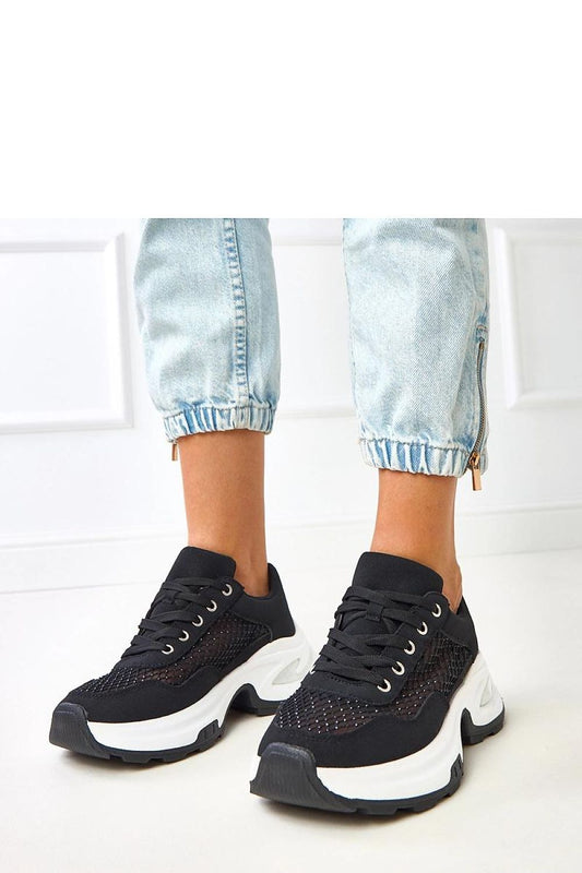 Close-up of Solea sports shoes showcasing intricate decorative zircons and classic round toe design, perfect for fashion-forward comfort.