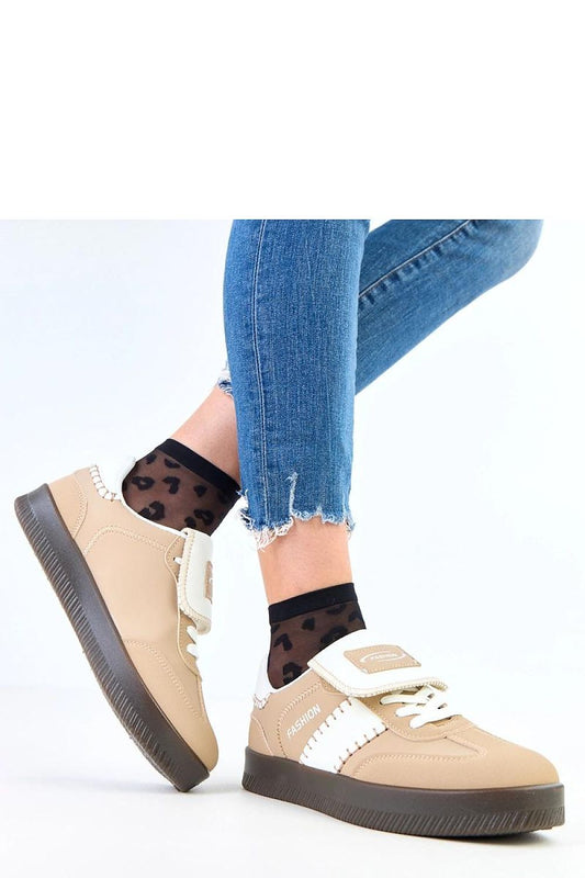 Close-up view of Solea Women's Lace-Up Sports Shoes showcasing the intricate decorative stitching and soft fabric insole for enhanced comfort and style.