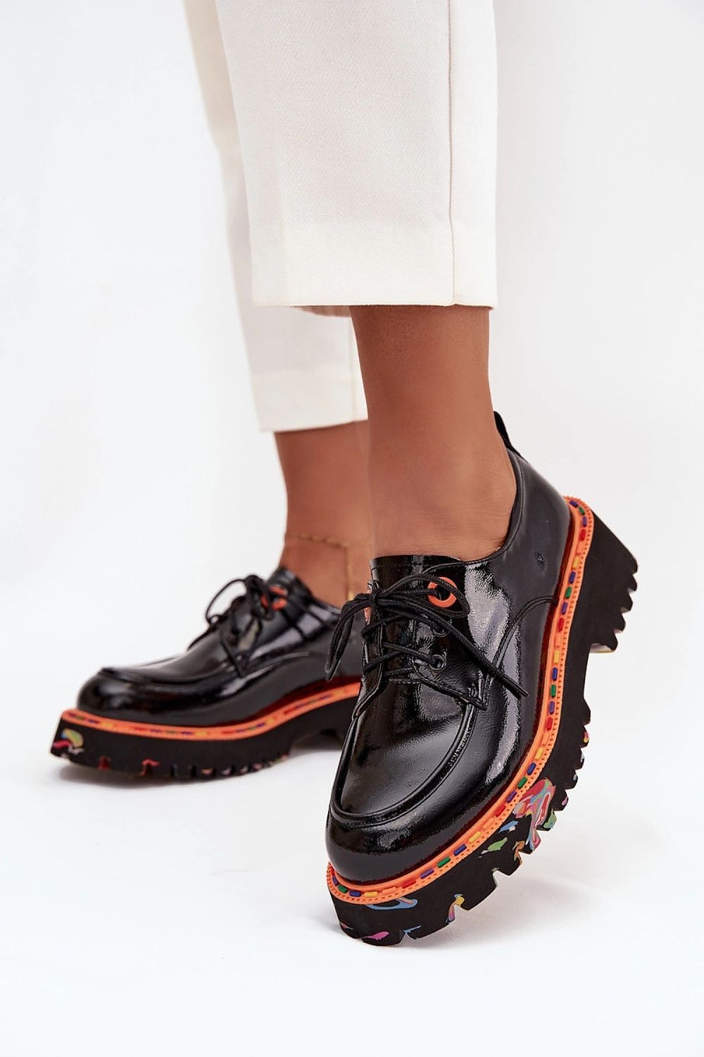 Stylish and comfortable women's patent leather shoes by Step in Style, designed with rounded toes and an elegant silhouette for any occasion.